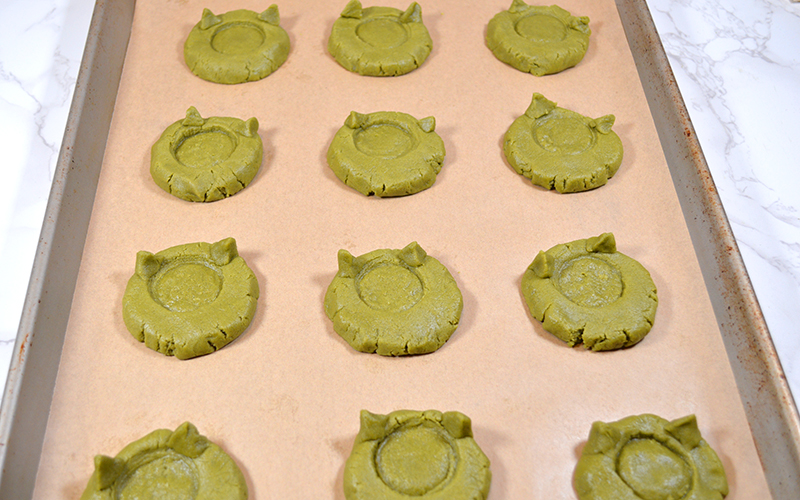 Raw matcha thumbprint cookies with horns
